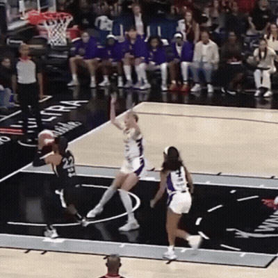 A Basketball Game Is Being Played On A Court That Has The Word Ultra On It GIF