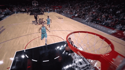 A Basketball Game Is Being Played On A Court That Says Arena GIF