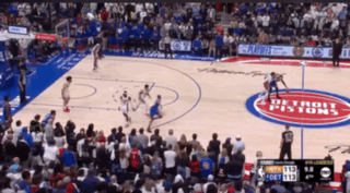 A Basketball Game Is Being Played On A Court That Says Detroit Pistons GIF