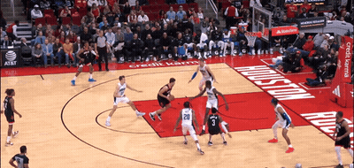 A Basketball Game Is Being Played On A Court That Says Houston On It GIF