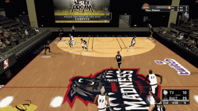 A Basketball Game Is Being Played On A Court That Says Madness On The Floor GIF