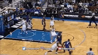A Basketball Game Is Being Played On A Court With A Hankook Advertisement In The Background GIF