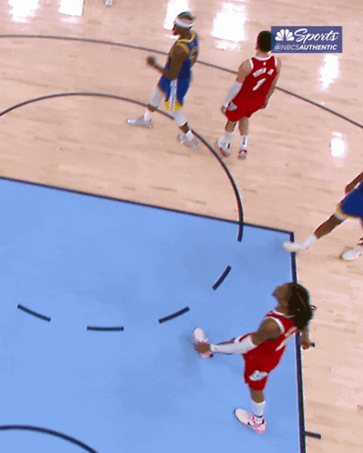 A Basketball Game Is Being Played On A Court With A Sports Logo GIF
