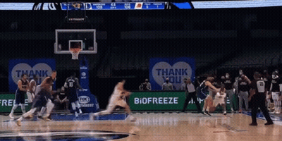 A Basketball Game Is Being Played On A Court With A Thank You Sign In The Background GIF