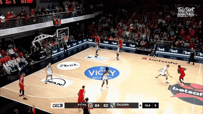 A Basketball Game Is Being Played On A Court With A Vicky Logo GIF