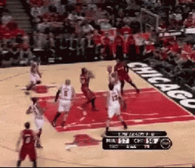 A Basketball Game Is Being Played On A Court With Chicago Written On The Side GIF