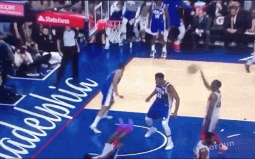 A Basketball Game Is Being Played On A Court With Philadelphia Written On It GIF