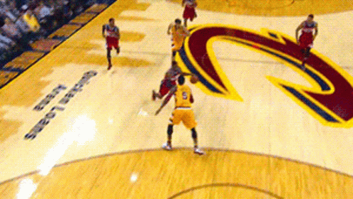 A Basketball Game Is Being Played On A Court With The Cleveland Cavaliers Logo On The Floor GIF