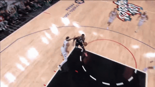 A Basketball Game Is Being Played On A Court With The Word Arena On It GIF