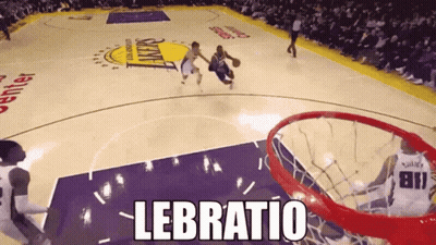 A Basketball Game Is Being Played On A Court With The Word Lebratio On It GIF