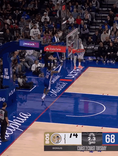 A Basketball Game Is Being Played On Coast 2 Coast GIF