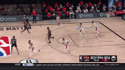 A Basketball Game Is Being Played On Tnt GIF