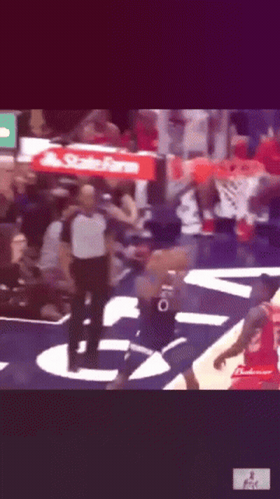 A Basketball Game Is Being Played With A State Farm Banner In The Background GIF