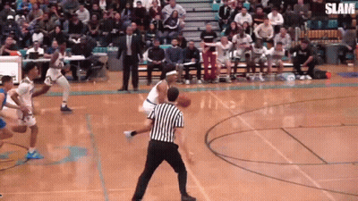 A Basketball Game Is Being Played With The Words Slam On The Bottom GIF