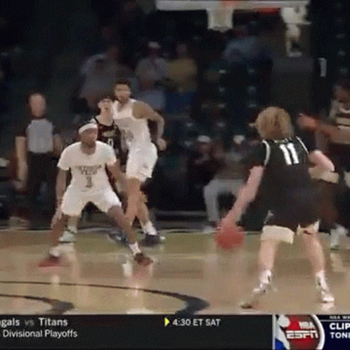 A Basketball Game Is Being Shown On Espn GIF