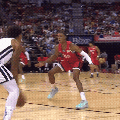 A Basketball Game Is Underway With A Boyd Advertisement In The Background GIF