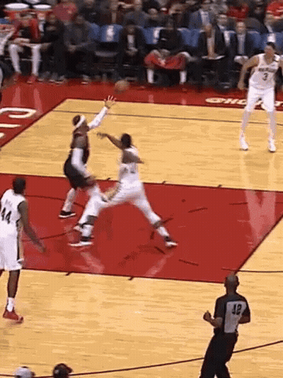 A Basketball Game Is Underway With A Referee Wearing Number 32 GIF