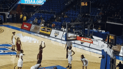 A Basketball Game Is Underway With A Scoreboard That Says Tssaa.org On It GIF