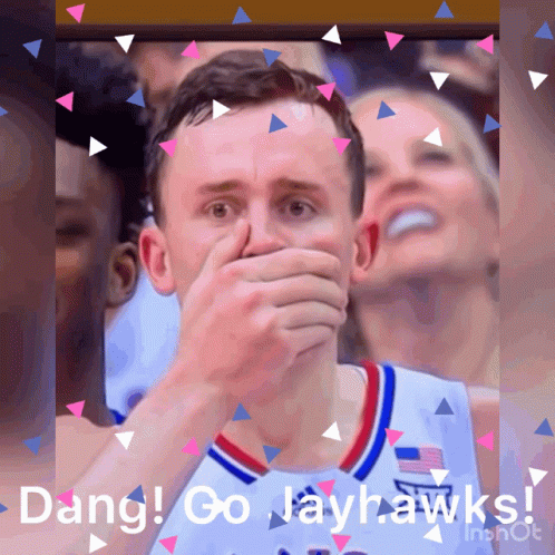 A Basketball Player Covering His Mouth With His Hand And The Words Dang Go Jayhawks On The Bottom GIF