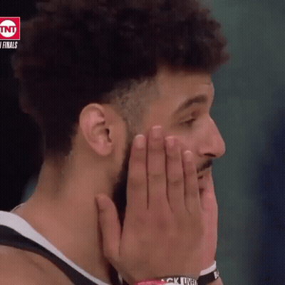 A Basketball Player Covering His Mouth With His Hands While Wearing A Wristband That Says " Black Lives Matter " GIF