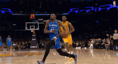 A Basketball Player For Oklahoma City Dribbles A Ball GIF