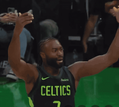 A Basketball Player For The Celtics Is On The Court GIF