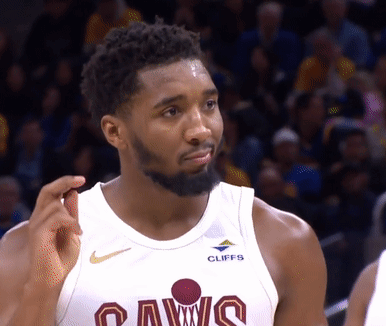 A Basketball Player For The Cleveland Cavs Looks At The Camera GIF