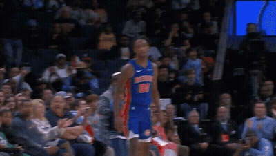 A Basketball Player For The Detroit Pistons Stands In Front Of The Crowd GIF
