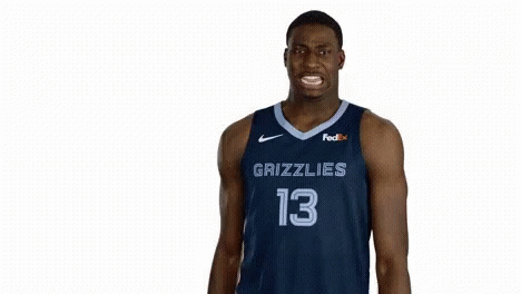 A Basketball Player For The Grizzlies Wears A Number 13 Jersey GIF