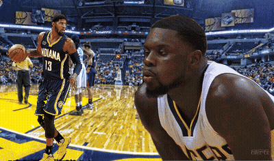 A Basketball Player For The Indiana Pacers Is Holding A Basketball GIF