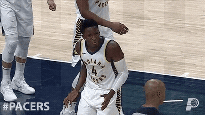 A Basketball Player For The Indiana Pacers Is Standing On The Court GIF