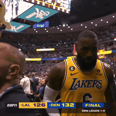 A Basketball Player For The Lakers Stands In Front Of A Crowd GIF