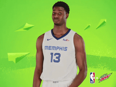 A Basketball Player For The Memphis Grizzlies Poses For A Picture GIF