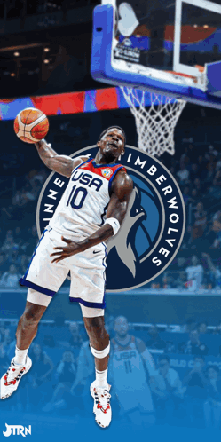 A Basketball Player For The Minnesota Timberwolves Is Jumping For The Ball GIF