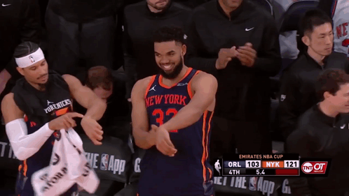 A Basketball Player For The New York Knicks Is Clapping His Hands GIF