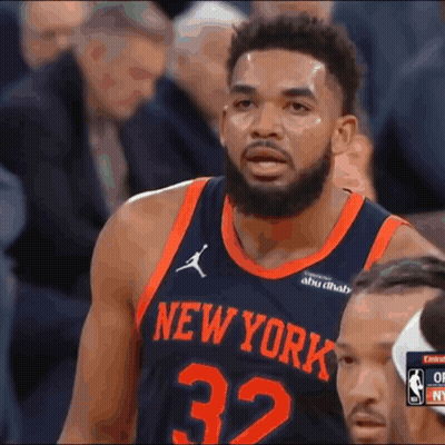 A Basketball Player For The New York Knicks Looks At The Camera GIF
