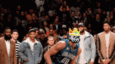 A Basketball Player For The Orlando Magic Wears A Pixelated Crown On His Head GIF