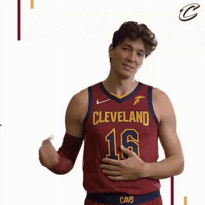 A Basketball Player From The Cleveland Cavs Flexes His Muscles GIF
