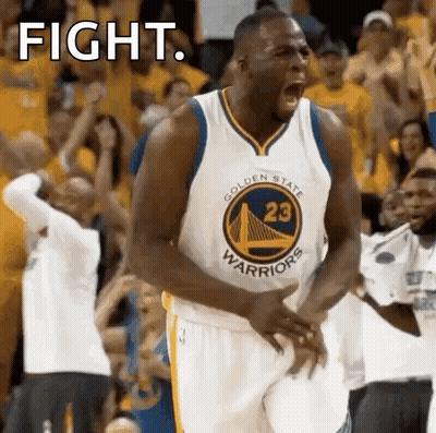 A Basketball Player From The Golden State Warriors Is Screaming In The Stands During A Game . GIF