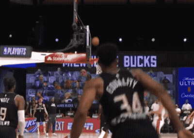 A Basketball Player In A Black Jersey With The Number 34 On It GIF