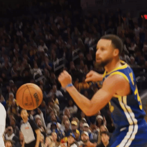 A Basketball Player In A Blue And Yellow Jersey With The Number 23 On It GIF
