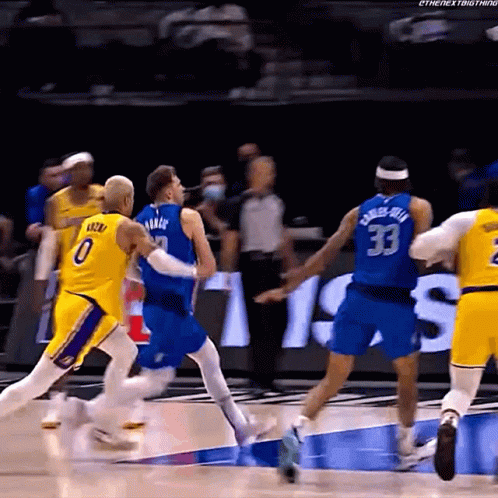 A Basketball Player In A Blue Jersey With The Number 33 On The Back GIF