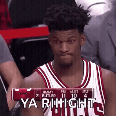 A Basketball Player In A Bulls Jersey Is Sitting In The Stands Watching A Game . GIF