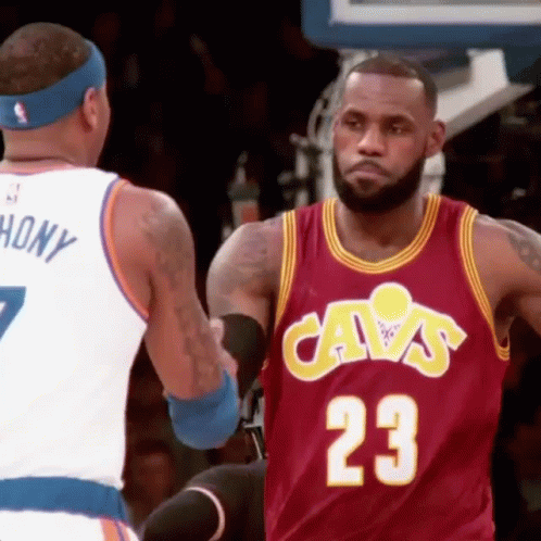 A Basketball Player In A Cavs Jersey Is Shaking Hands With Anthony Hony . GIF