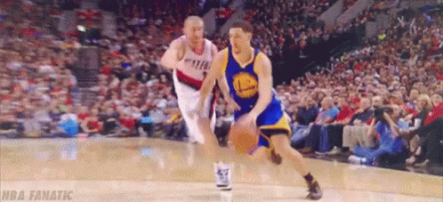 A Basketball Player In A Golden State Warriors Uniform Dribbles The Ball GIF