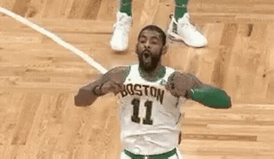 A Basketball Player In A Green And White Jersey With The Number 11 On It GIF