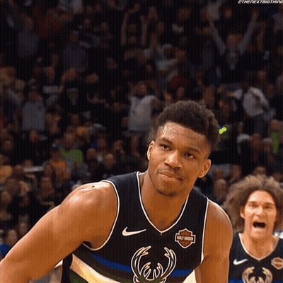 A Basketball Player In A Harley Davidson Jersey GIF