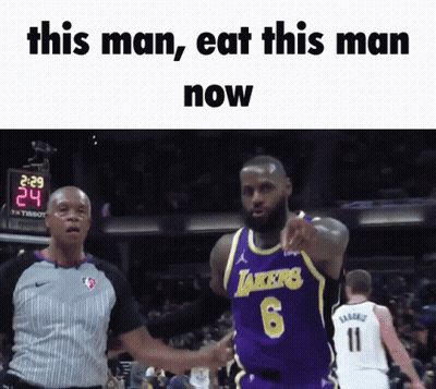 A Basketball Player In A Lakers Jersey Is Pointing At The Camera GIF