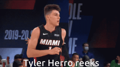 A Basketball Player In A Miami Jersey Is Running GIF