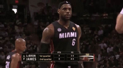 A Basketball Player In A Miami Jersey Stands On The Court GIF